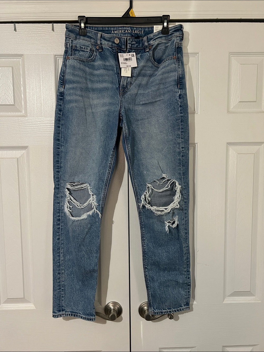 NWT.  American Eagle Outfitters Light Blue Distressed Boyfriend Jeans